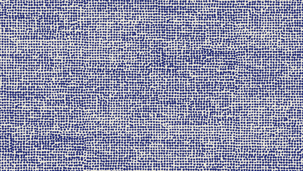 Orkanen wallpaper by Marimekko in indigo and greige with an allover dotted, textured pattern.