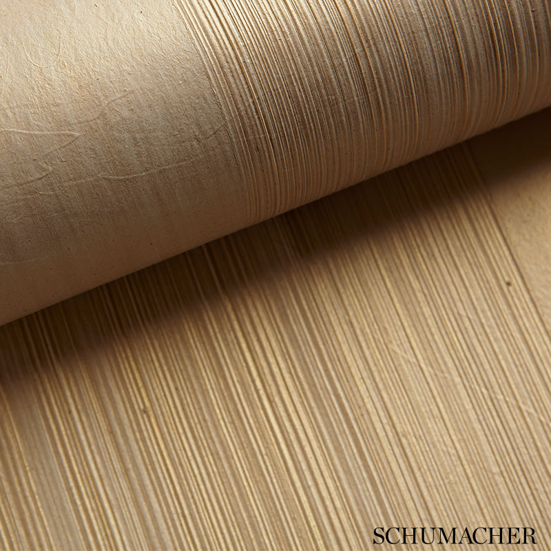 Close-up of Schumacher Casual Brush ivory handcrafted textured wallcovering with horizontal brushstroke pattern.