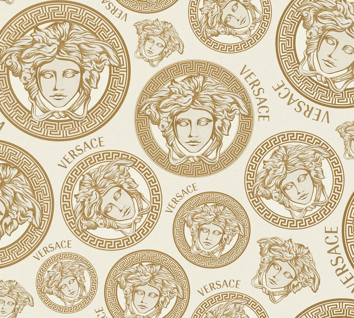 Versace Monarch wallpaper with gold foiled Medusa medallions on a cream background