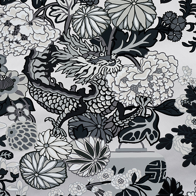 Chiang Mai Dragon Smoke wallpaper by Schumacher featuring a bold chinoiserie dragon and floral motif in black, white, and grey tones.