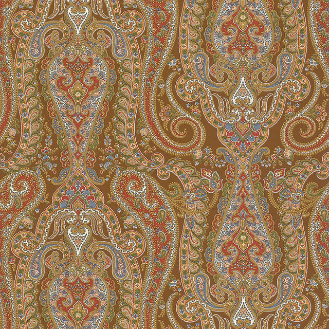 ISABELLA PAISLEY wallpaper in Mink by Schumacher. Ornate paisley pattern in brown, red, blue, and gold tones.