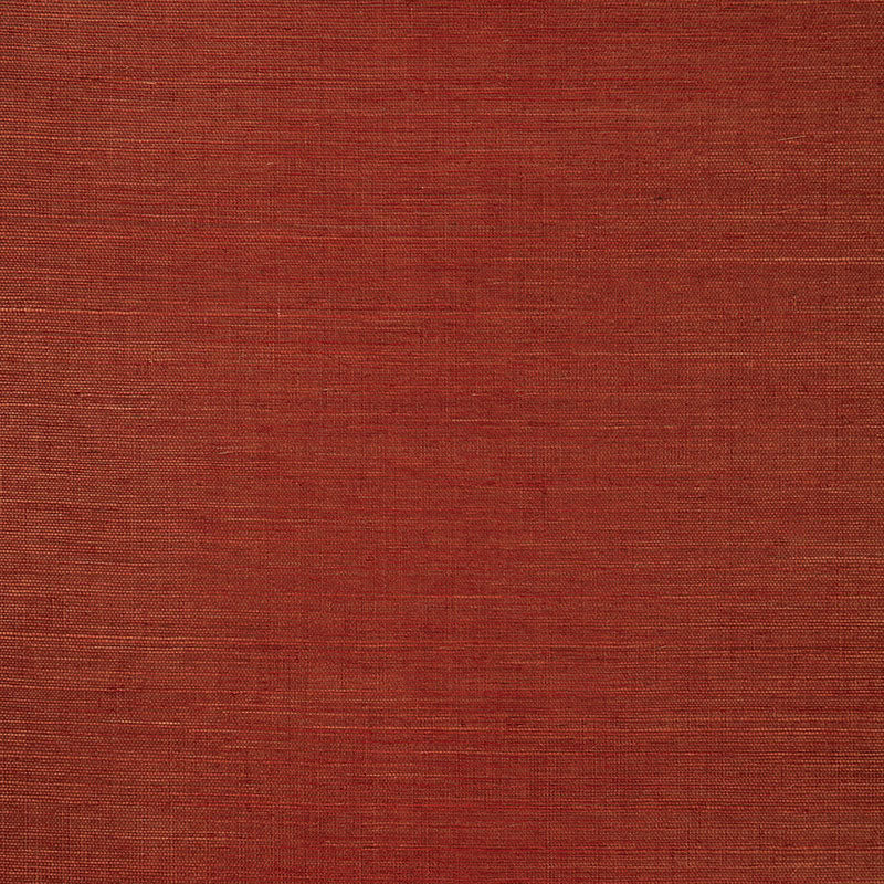 Haruki Sisal Garnet wallcovering by Schumacher, textured red sisal wallpaper sample and styled interior view.