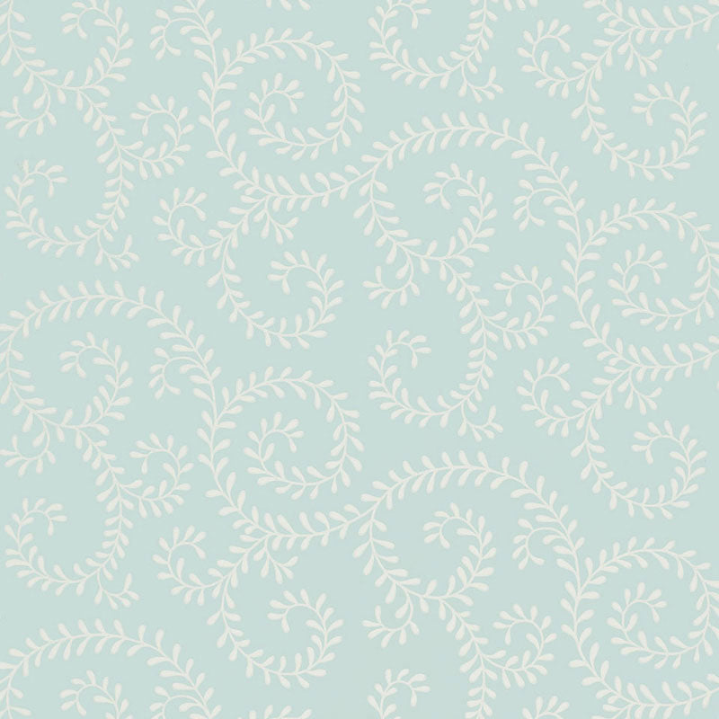 Leafy Scroll wallpaper in Sky by Schumacher, featuring a scrolling vine pattern inspired by embroidery, shown in a bathroom interior and close-up.