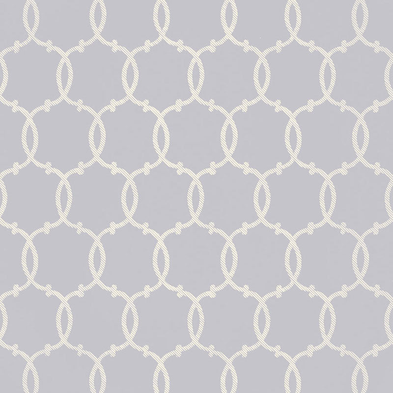 Tracery wallpaper in Wisteria by Schumacher, featuring a rope lattice geometric pattern in soft lavender and white.