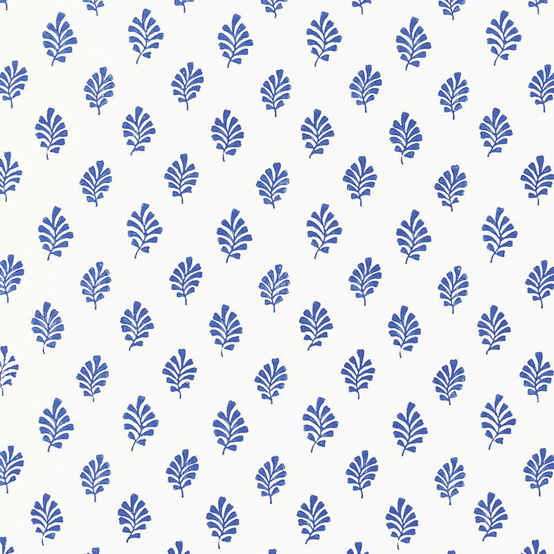 Bakara Leaf Delft blue hand screen printed wallpaper by Schumacher shown in a bathroom interior and close-up pattern view.