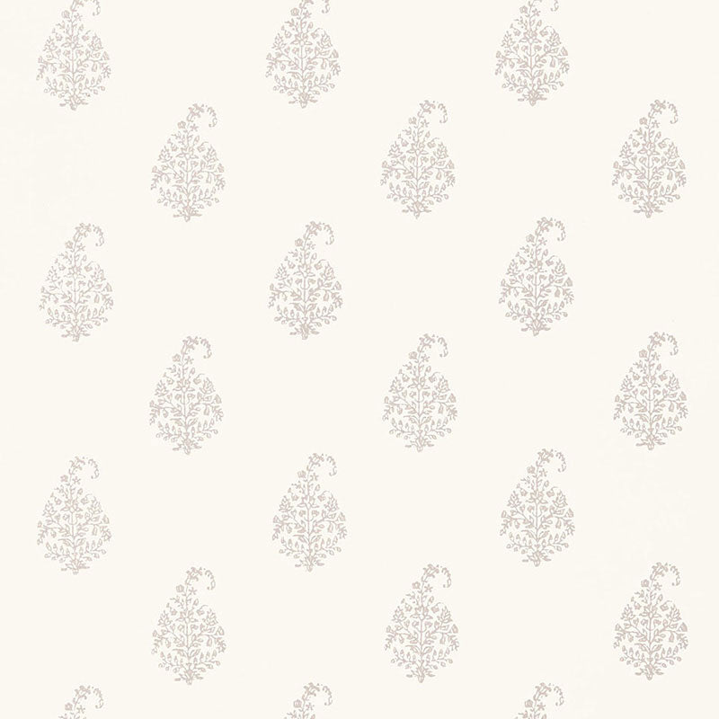 Kerala Paisley wallpaper in Oyster by Schumacher, a hand screen printed classic paisley wallcovering with floral and lace-like details.