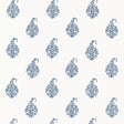 Kerala Paisley Delft blue and white paisley wallpaper by Schumacher shown in a living room interior and as a pattern close-up.