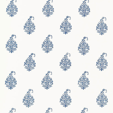Kerala Paisley Delft blue and white paisley wallpaper by Schumacher shown in a living room interior and as a pattern close-up.
