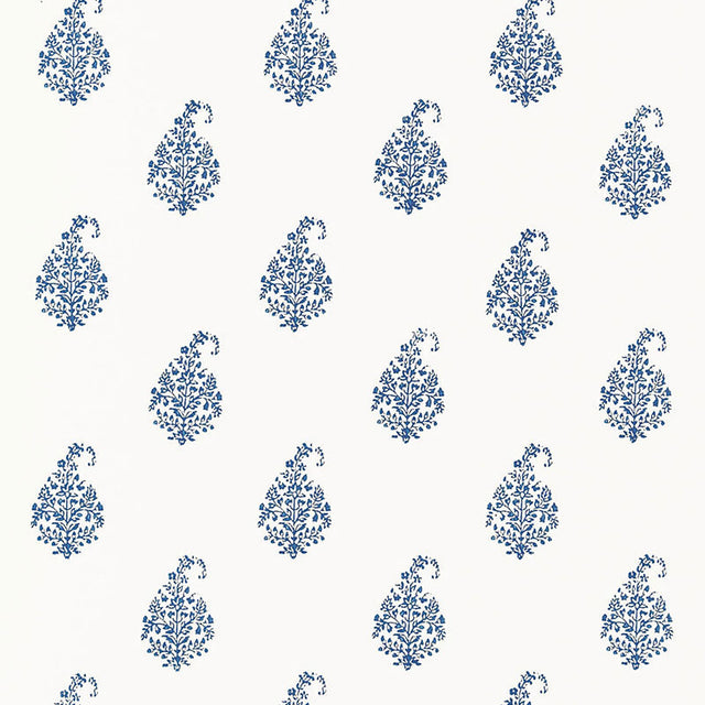 Kerala Paisley Delft blue and white paisley wallpaper by Schumacher shown in a living room interior and as a pattern close-up.
