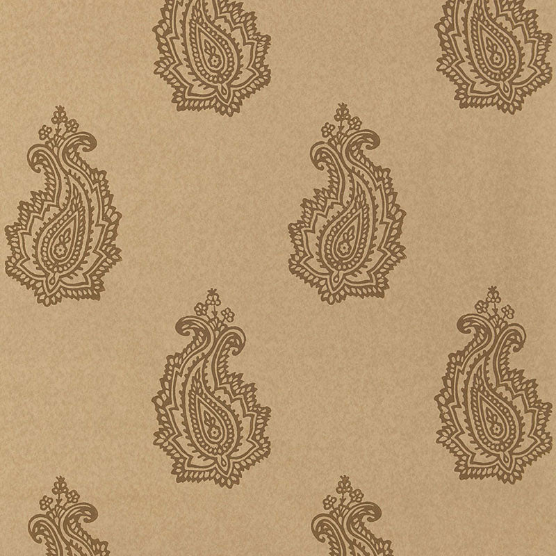 Madras Paisley wallpaper in Tabac by Schumacher, featuring a classic paisley block print design in warm neutral tones.