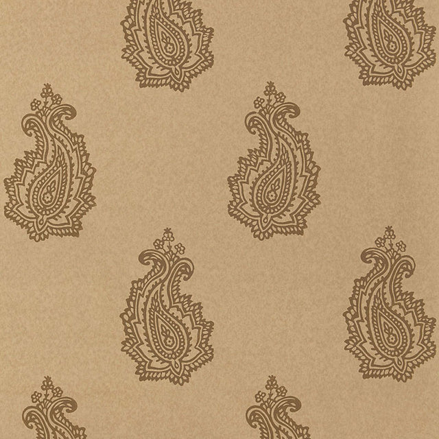 Madras Paisley wallpaper in Tabac by Schumacher, featuring a classic paisley block print design in warm neutral tones.