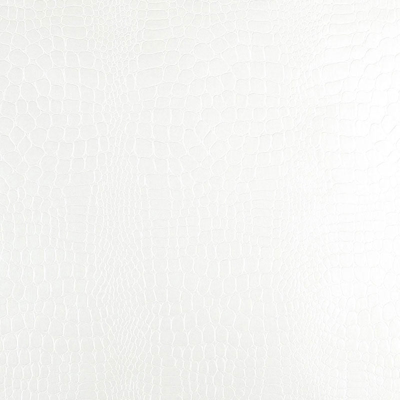 White crocodile-embossed luxury wallpaper by Schumacher, shown in close-up and in a roll with other colorways.