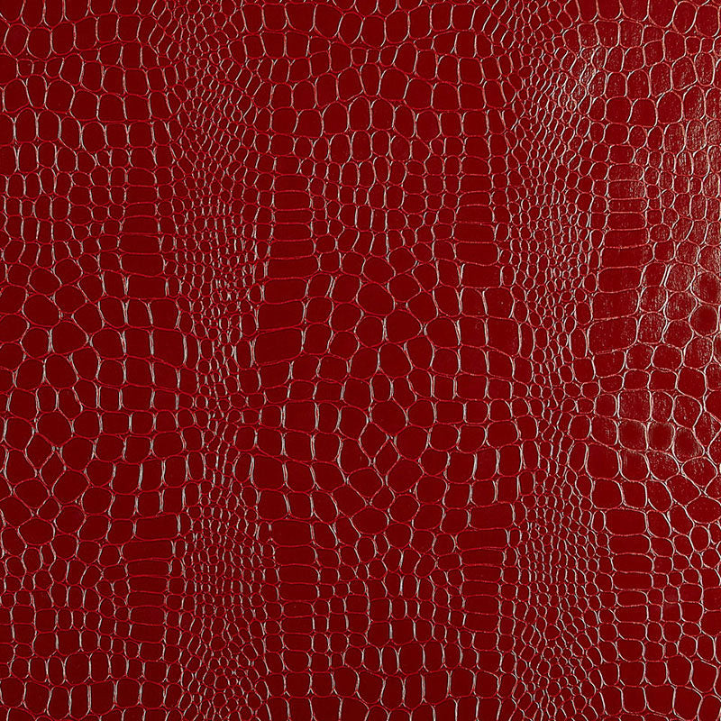 Crimson red crocodile embossed wallpaper with a luxurious, textured finish by Schumacher.