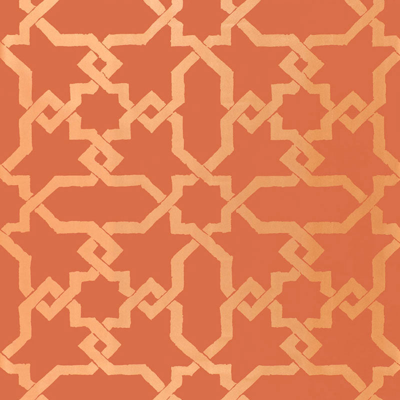 Cordoba Cinnabar wallpaper by Schumacher features interlocking Moorish-inspired diamonds and stars in a hand-painted look.