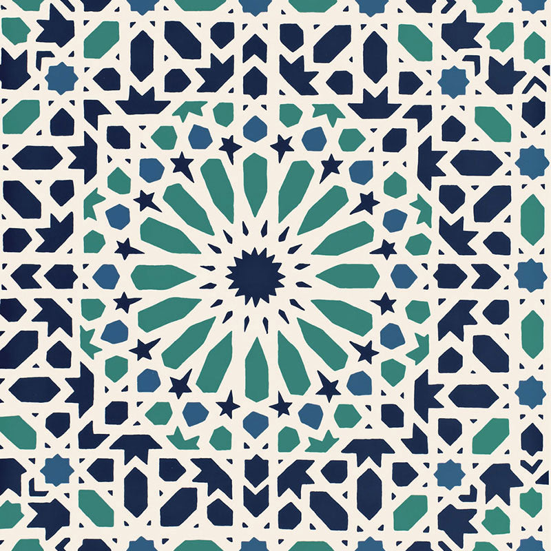 Nasrid Palace Mosaic wallpaper in Aegean by Schumacher, featuring a geometric mosaic pattern in blue and green tones inspired by Moorish design.
