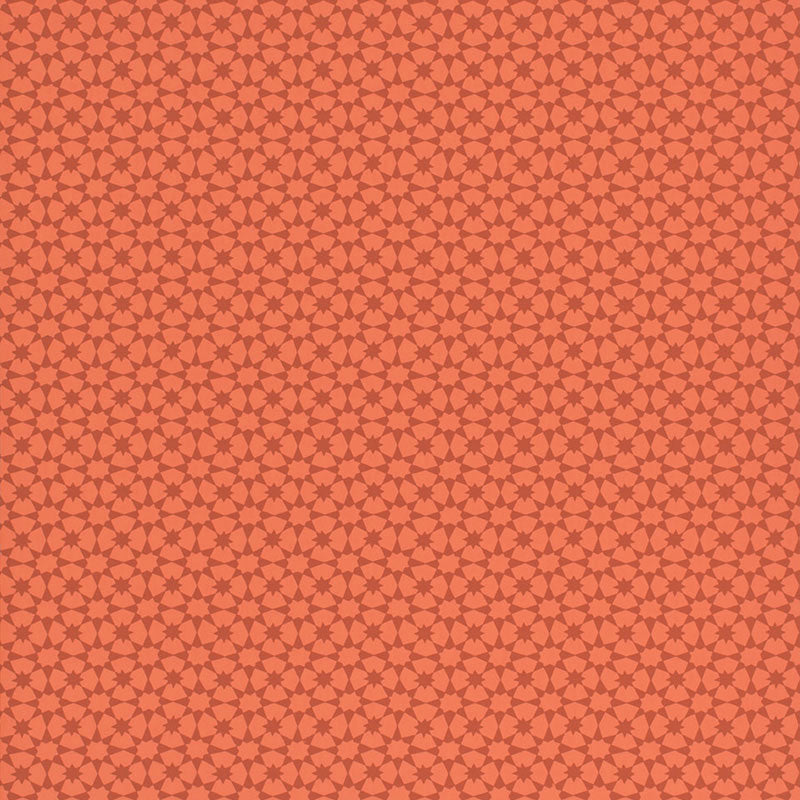 Medina Persimmon geometric wallpaper by Schumacher, intricate small-scale pattern in orange-red tones