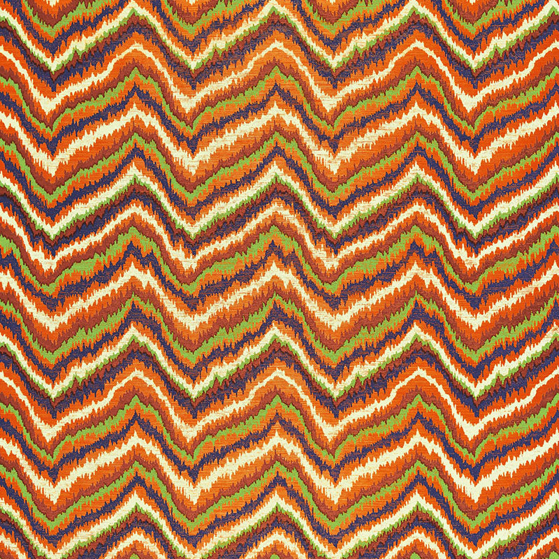 Multicolored bargello zigzag pattern printed on woven sisal wallcovering by Schumacher, designed by Celerie Kemble.