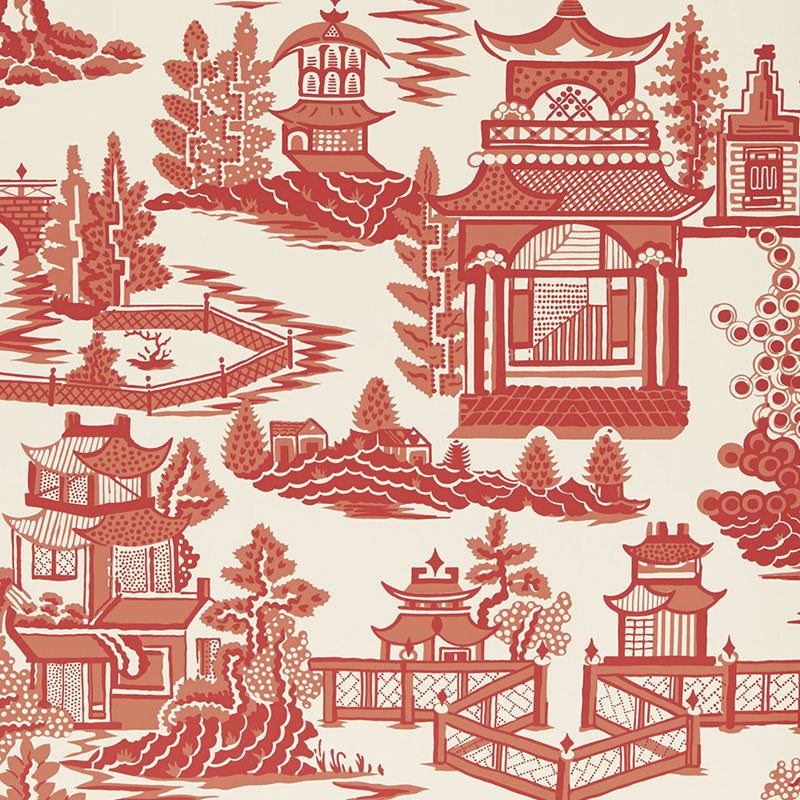 NANJING wallpaper in coral colorway featuring chinoiserie pagodas and landscape motifs by Schumacher.