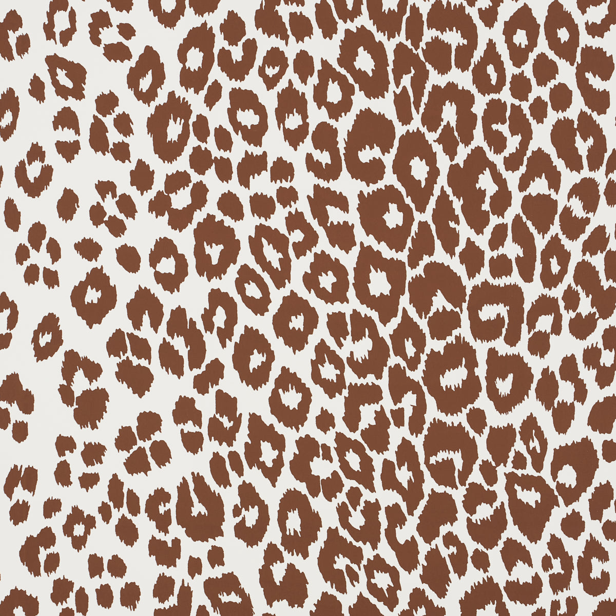 Brown and white leopard print wallpaper from Schumacher's Preppy Chic collection, shown in close-up and styled room settings.