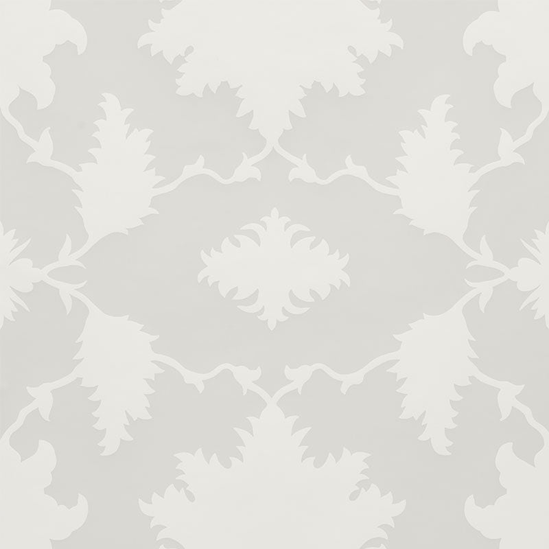 Garden of Persia Quartz wallpaper by Mary McDonald for Schumacher, large-scale Persian-inspired floral damask in white and soft grey, shown in a dining room setting.