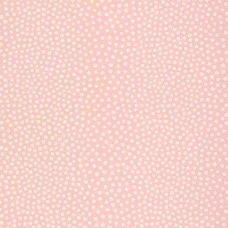 Raindots wallpaper in washed pink with irregular polka dot pattern by Schumacher