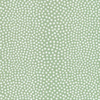 Raindots Spring irregular polka dot wallpaper by Schumacher in green and white