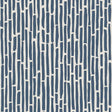 Bamboo Marine wallpaper by Schumacher, a lively and graphic surface-printed wallcovering with a dense bamboo thicket pattern in blue and white.