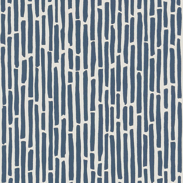 Bamboo Marine wallpaper by Schumacher, a lively and graphic surface-printed wallcovering with a dense bamboo thicket pattern in blue and white.
