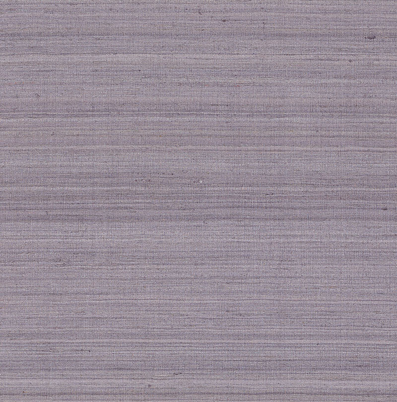 Shaded Silk Thistle fabric wallcovering by Schumacher, featuring a striated silk texture in a soft purple hue.