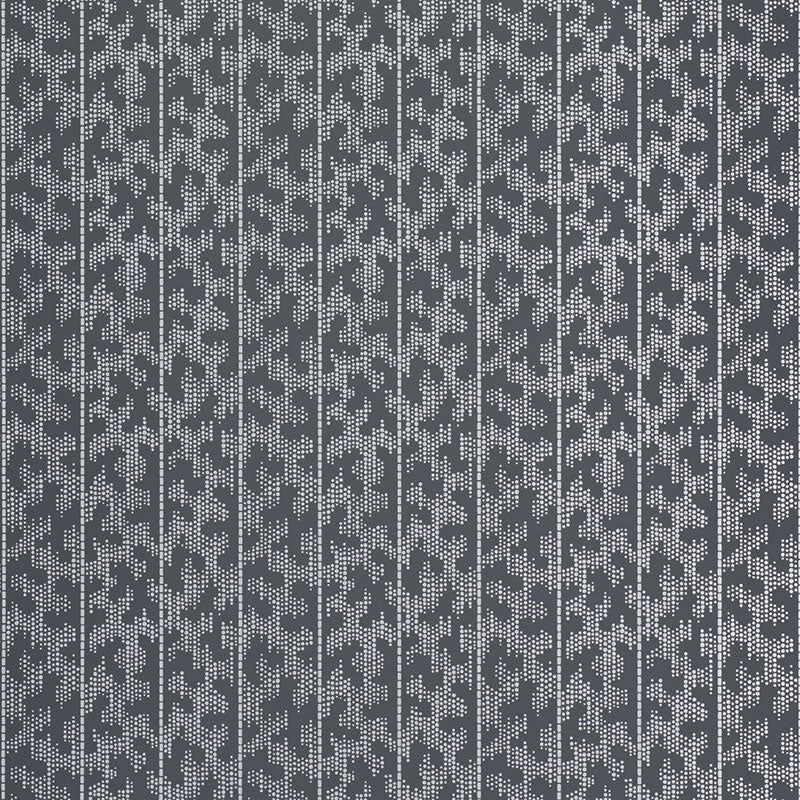 Montpellier Silver Stellar wallpaper by Schumacher in a modern bathroom setting, featuring a dotted geometric pattern in silver and grey tones.