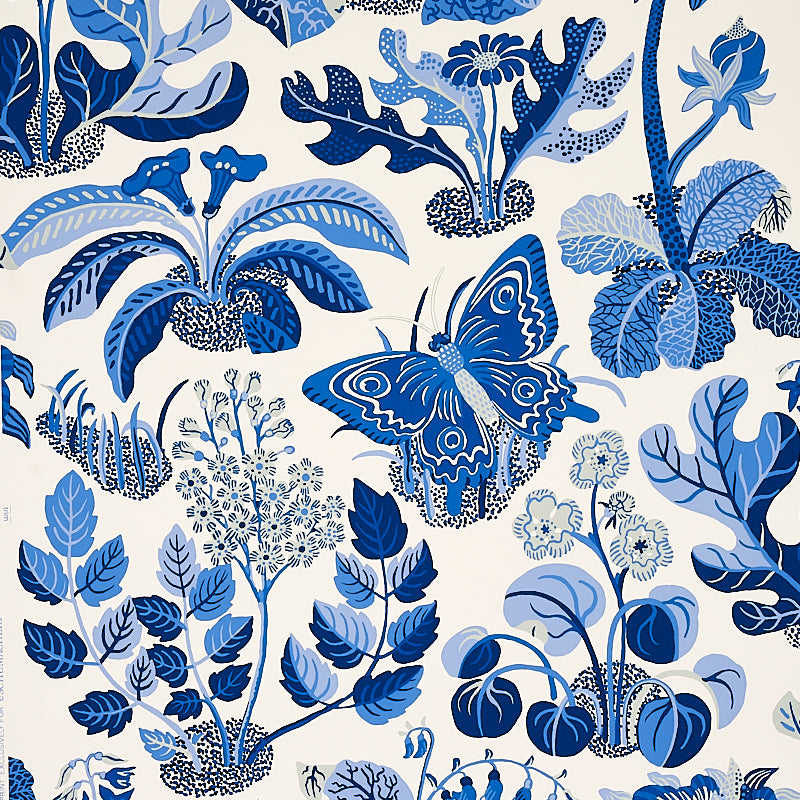 Exotic Butterfly Marine wallpaper by Schumacher featuring blue butterflies and botanical motifs in a whimsical, modern style.