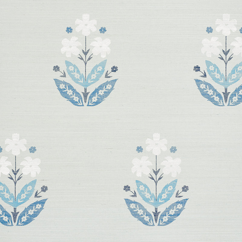 Floweret Sisal wallpaper in blue and white, featuring a large-scale stylized floral pattern on textured sisal background.