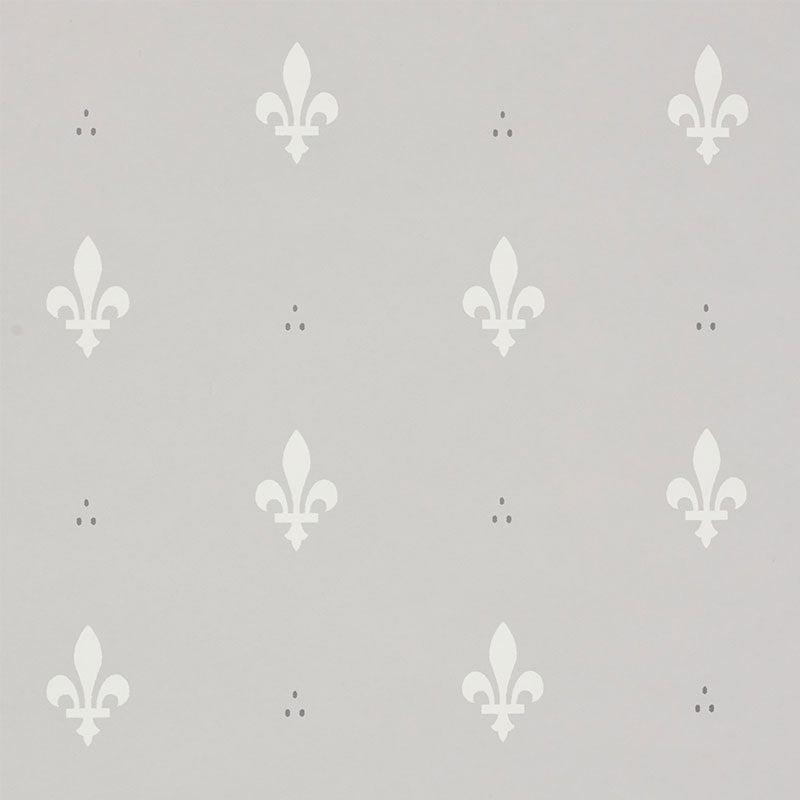 Grey wallpaper with a classic white fleur de lis pattern by Schumacher, shown both as a close-up and installed in a traditional room.