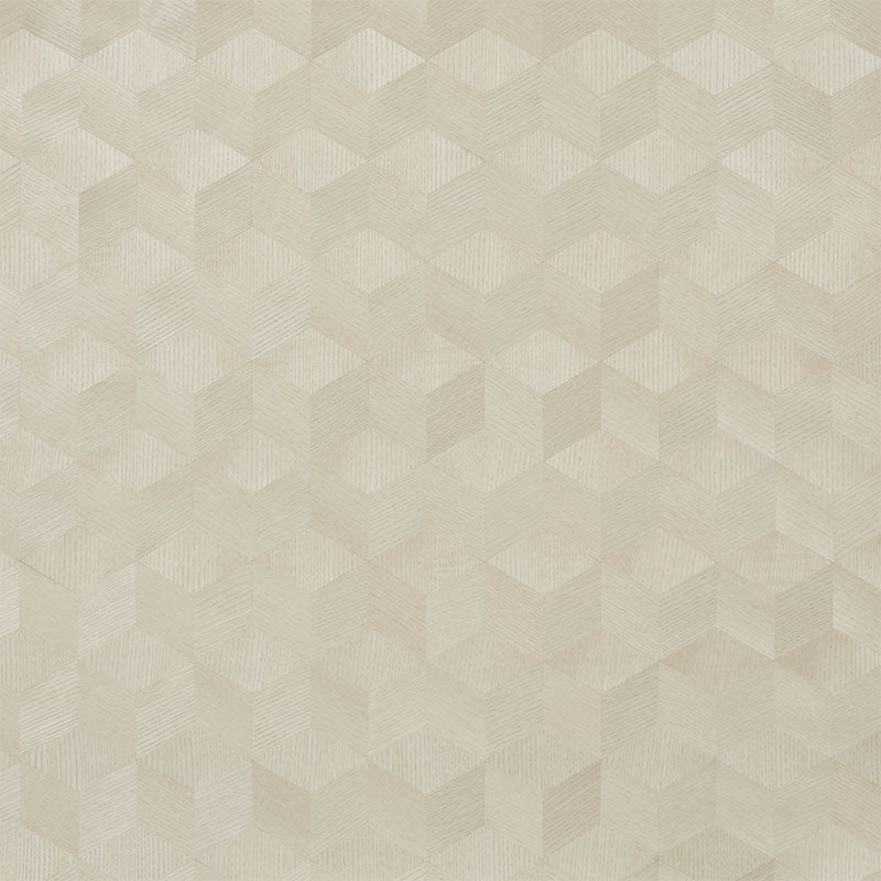 Chevron Inlay Blond handmade wood veneer geometric wallpaper by Schumacher, shown in a modern interior setting.