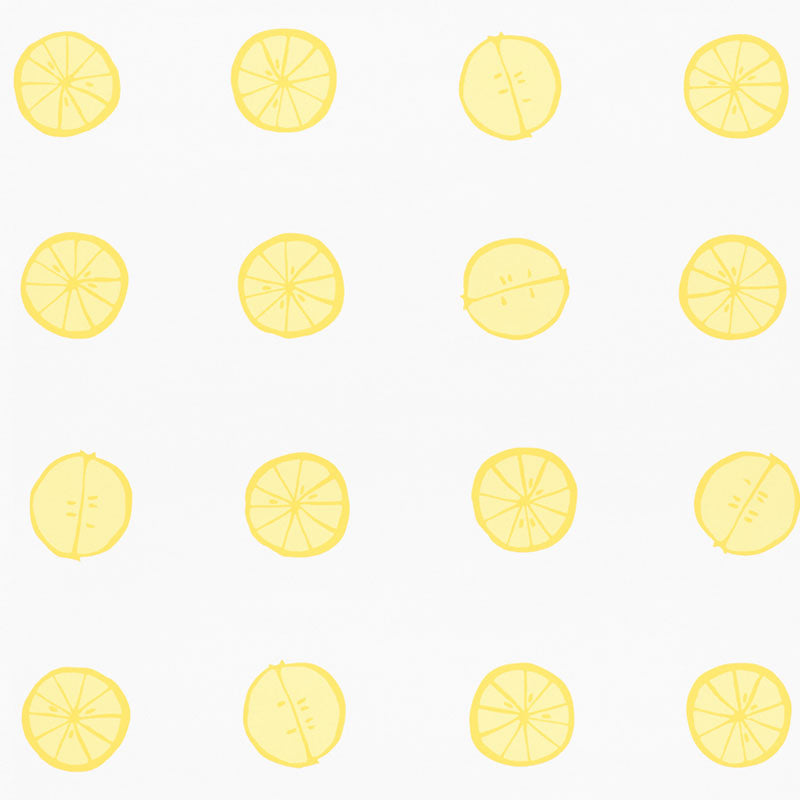 Lemonade wallpaper by Vera Neumann for Schumacher featuring whimsical hand-drawn lemon slices in a polka dot pattern on a white background.