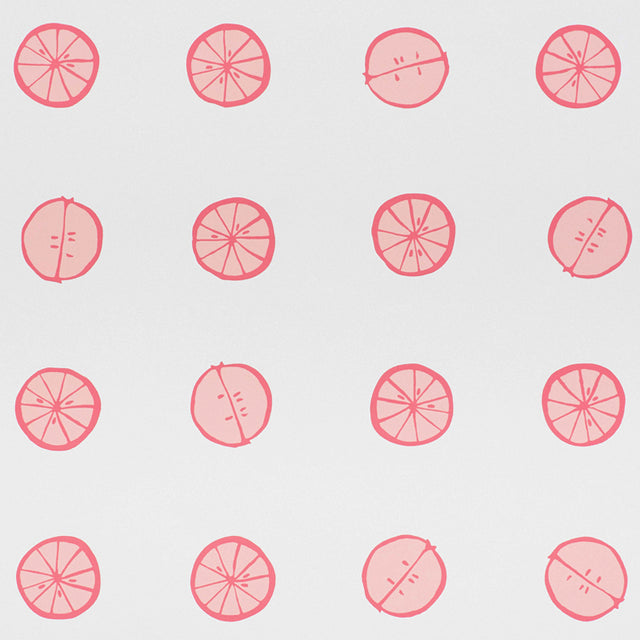 Lemonade wallpaper in Grapefruit by Vera Neumann for Schumacher, featuring whimsical hand-drawn citrus slices in a polka dot pattern.