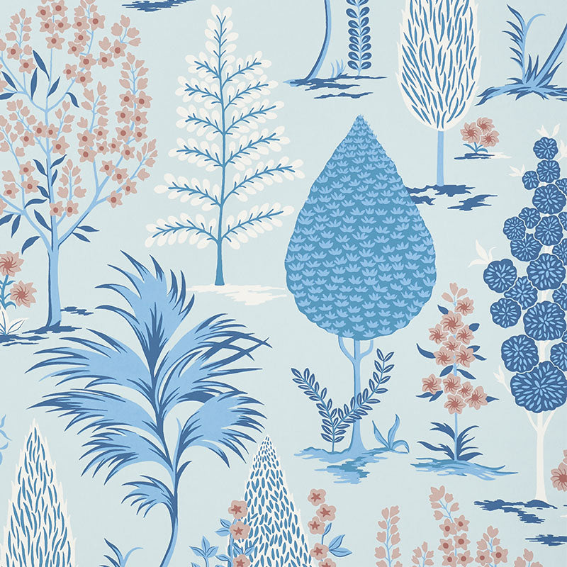 Pandora wallpaper in Delft & Rose by Schumacher, featuring a whimsical grove of stylized trees in blue and rose tones.