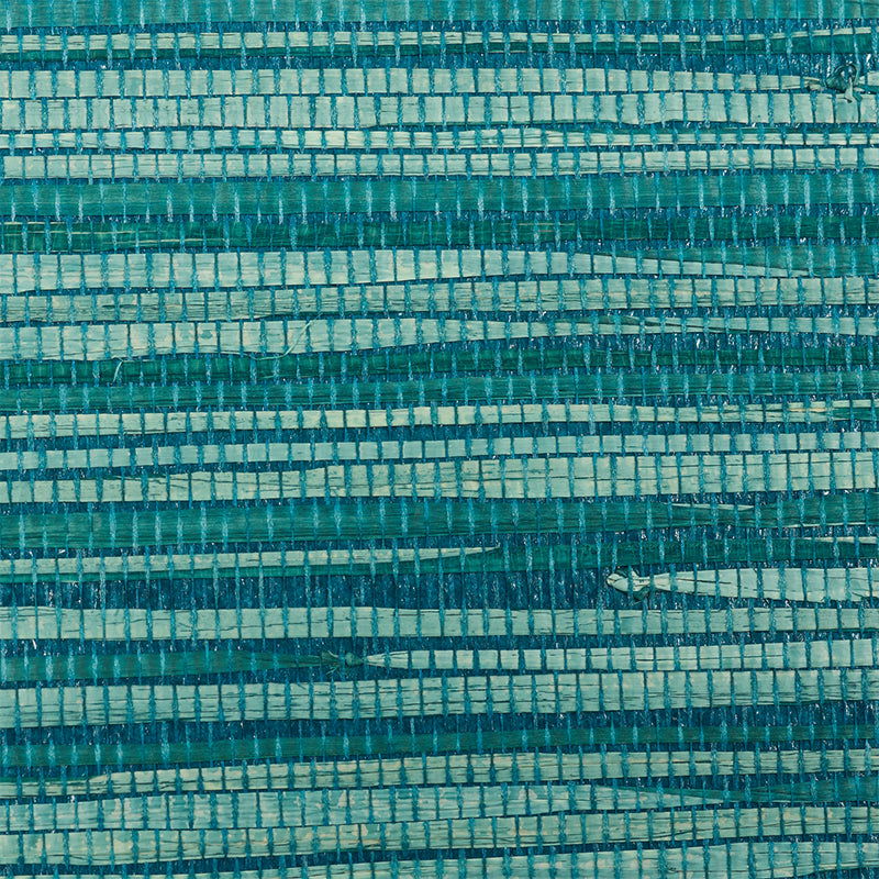 Close-up and full panel view of Dyed Raffia Peacock textured wallcovering by Schumacher, featuring woven raffia fibers in blue-green tones.