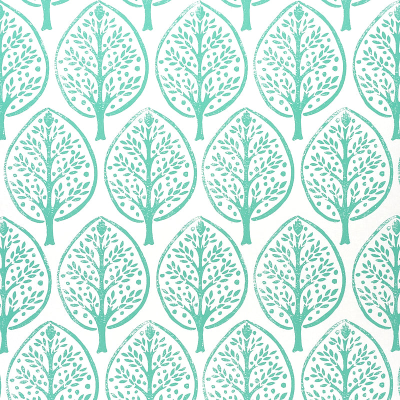 Tree Seaglass by Molly Mahon for Schumacher. Stylized tree motif wallpaper in green-blue on white, shown in room and detail views.