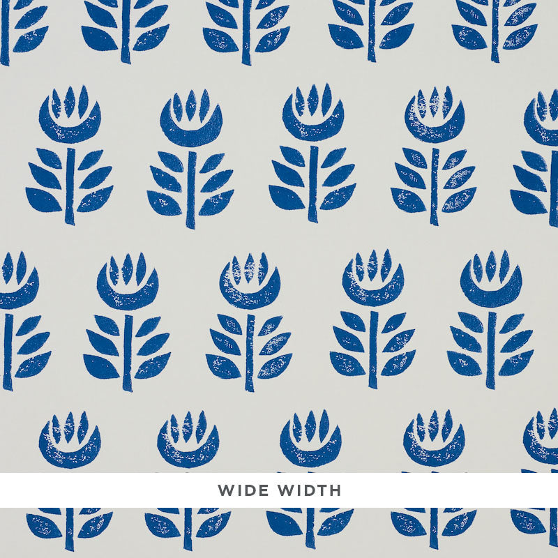 Rosenborg Navy stylized tulip Scandinavian modern wallpaper by Schumacher, shown in a bathroom interior and close-up pattern view.