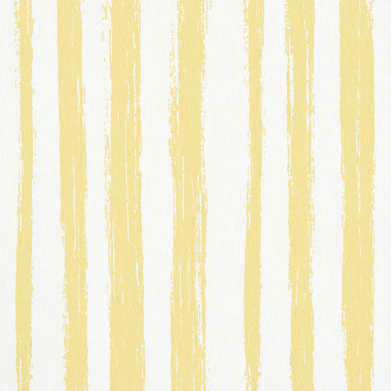 Sketched Stripe yellow hand-painted vertical stripe wallpaper by Schumacher, shown in close-up and styled room setting.
