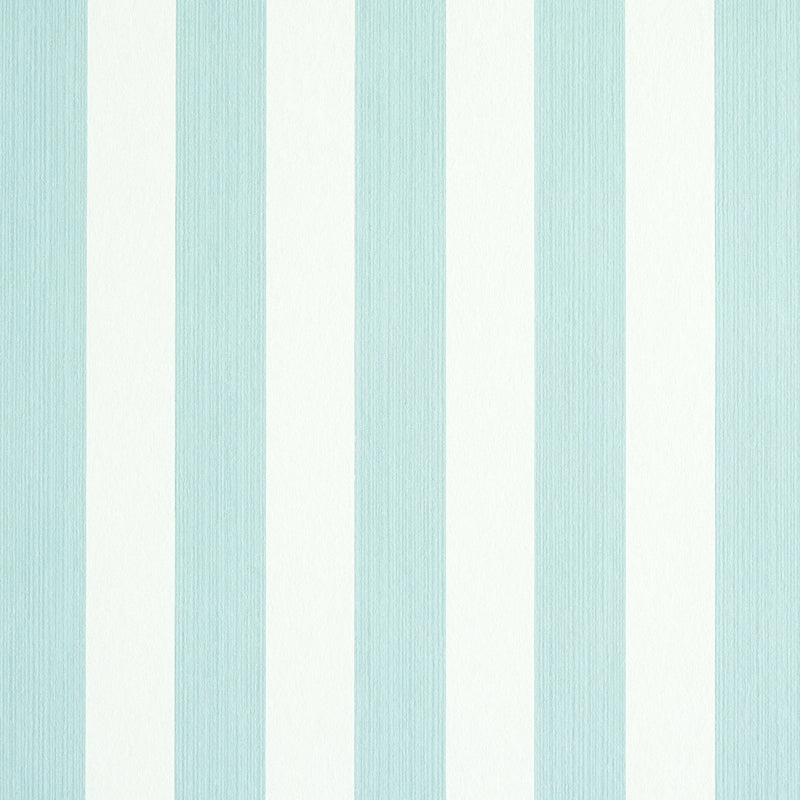 Edwin Stripe Medium wallpaper in Mineral by Schumacher, classic vertical stripe wallcovering in a serene blue and white colorway, styled in a bedroom setting.