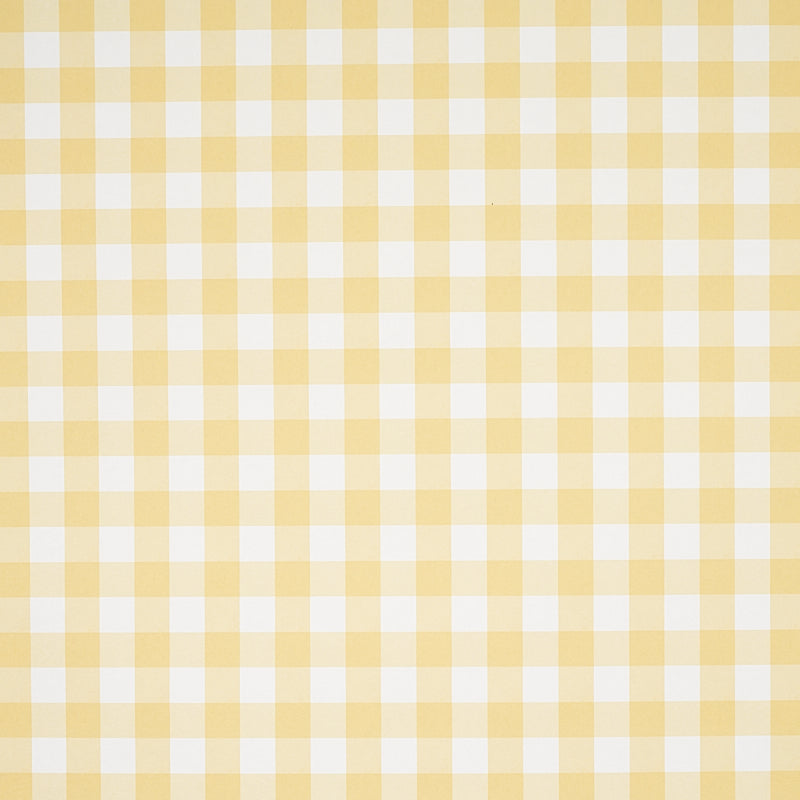 Willa Check Small yellow gingham plaid wallpaper by Schumacher shown in close-up and installed in a bright kitchen interior.