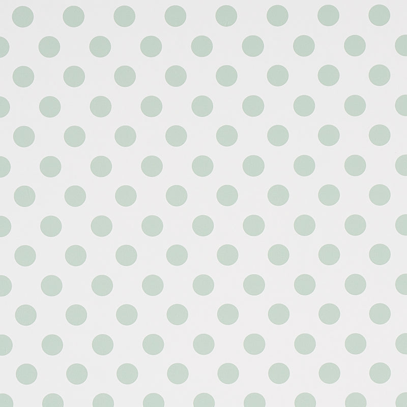 Lady Sage polka dot wallpaper by Cristina Buckley for Schumacher, shown in a modern interior setting.