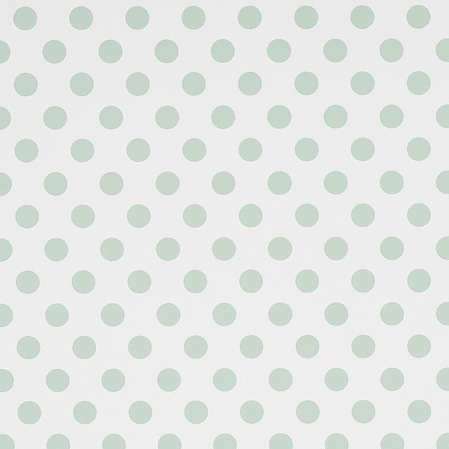 Lady Sage polka dot wallpaper by Cristina Buckley for Schumacher, shown in a modern interior setting.