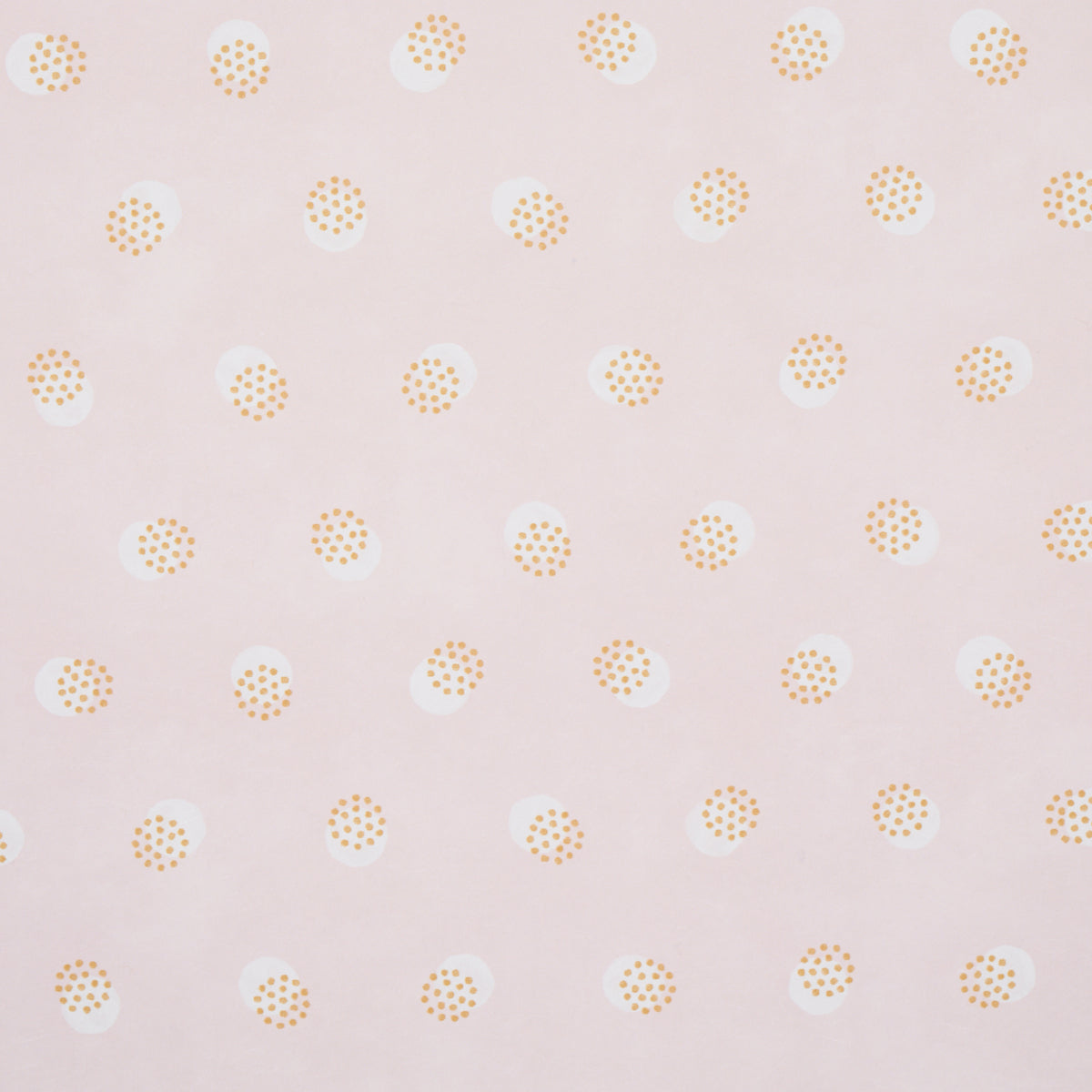 Taylor Pink wallpaper by Schumacher featuring offset-printed bursts of tiny dots over a field of larger dots, shown in a bathroom setting.
