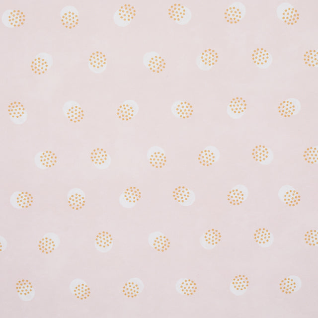 Taylor Pink wallpaper by Schumacher featuring offset-printed bursts of tiny dots over a field of larger dots, shown in a bathroom setting.