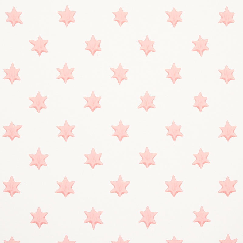 Astral pink wallpaper by Schumacher featuring small six-pointed stars in neat offset rows, designed by Hobe Erwin.