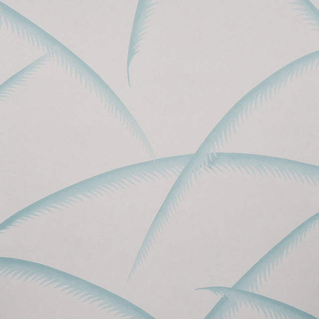 Deco Palms wallpaper in Seaglass by Schumacher, featuring stylized palm fronds in soft blue-green on a light background.