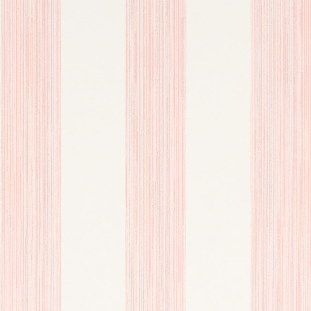 Edwin Stripe Wide wallpaper in Petal by Schumacher, featuring wide pink and white stripes, shown in a bright, classic interior setting.